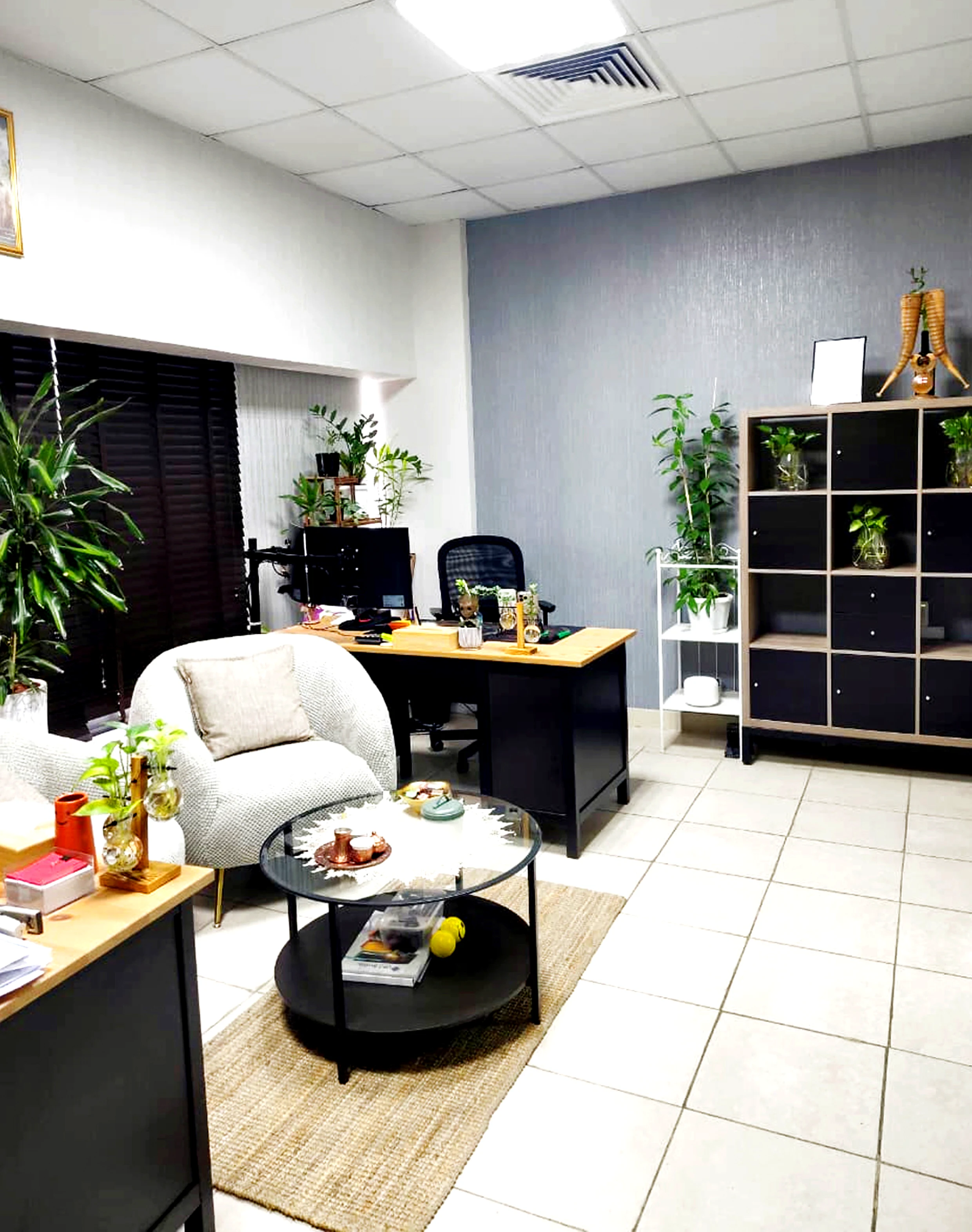 Professional project manager workspace at Xshore Equipment office in Mussafah
